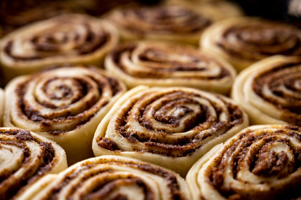 Cinnamon Rolls Rising in cast iron skillet