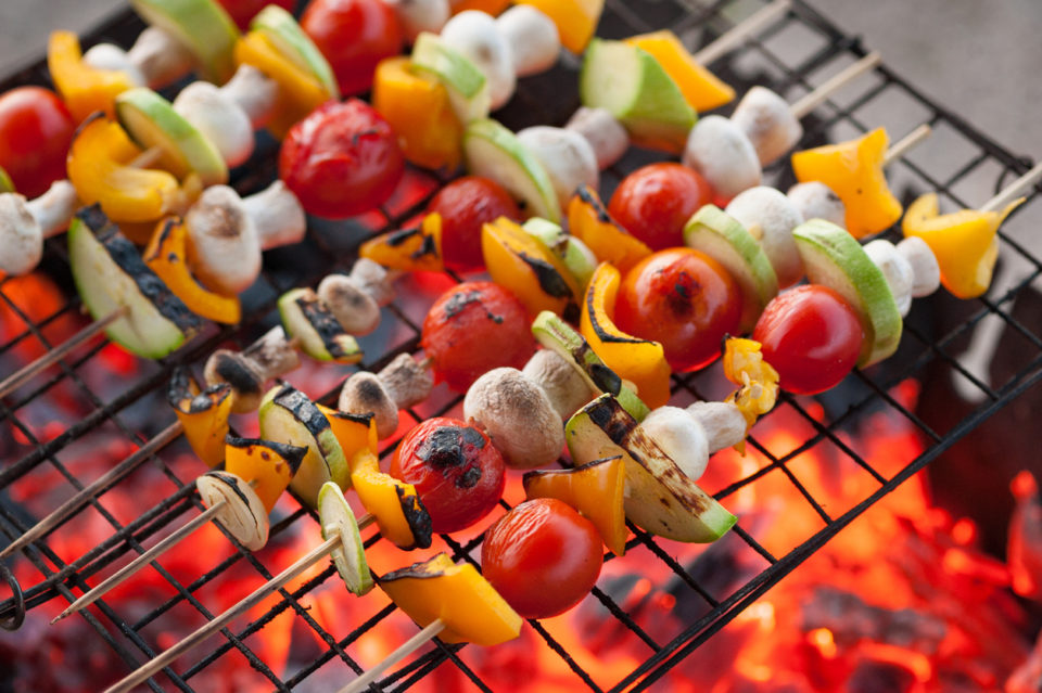 Grilled vegetables kebab. Burning red coals