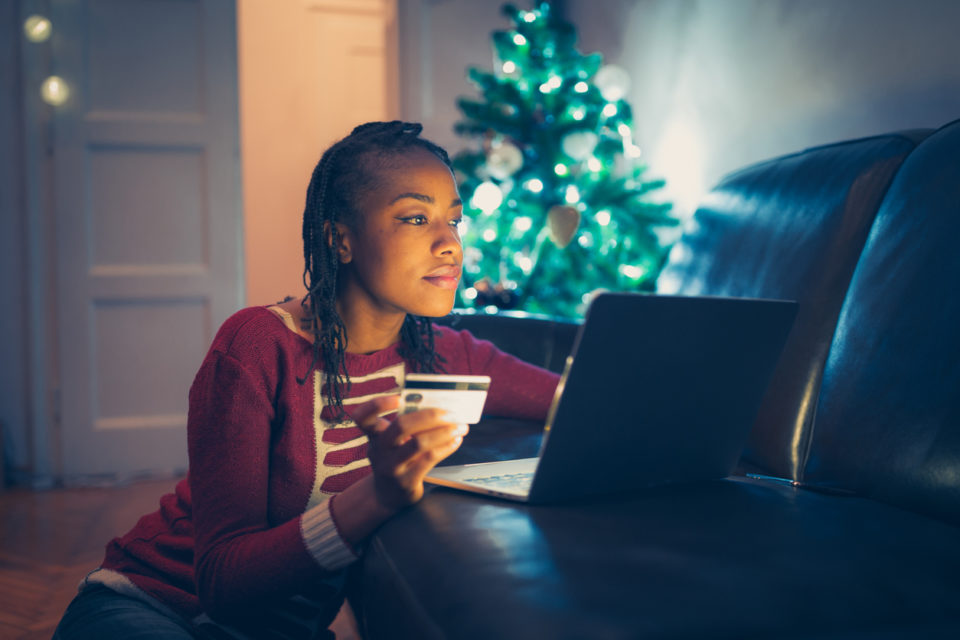 Woman buying Christmas gifts online